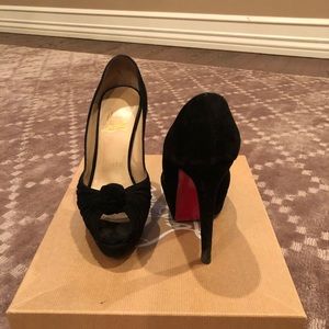Christian louboutin pumps with a knot on top